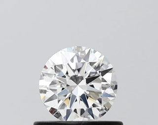 0.51ct round lab-grown diamond on display stand, color D, VS2 clarity, VG cut, IGI certified