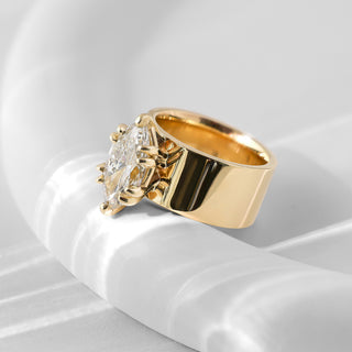 Marquise Cigar Band ring, Malakan Diamond Co., gold tone with marquise-cut diamond