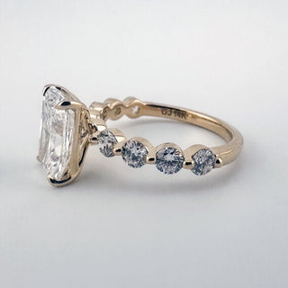 Radiant Floating Diamond Ring diamond center stone with diamond-studded band