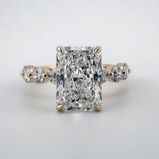 Radiant Floating Diamond Ring with radiant-cut center diamond and side stones
