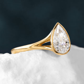 Bezel Pear Solitaire Ring with pear-cut lab diamond in 14k Yellow Gold setting