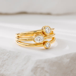 14K Yellow Gold Bezel Set Oval and Round Diamond Ring