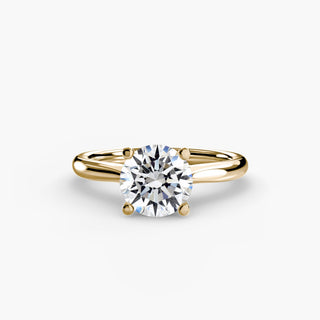 ring with large round gemstone held by four prongs on a simple band