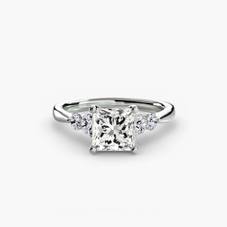 Completed Ring US size 9 featuring large central diamond with side diamonds.